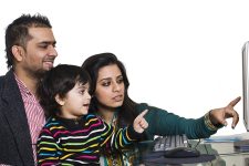 happy multi ethnic family of three enjoying together